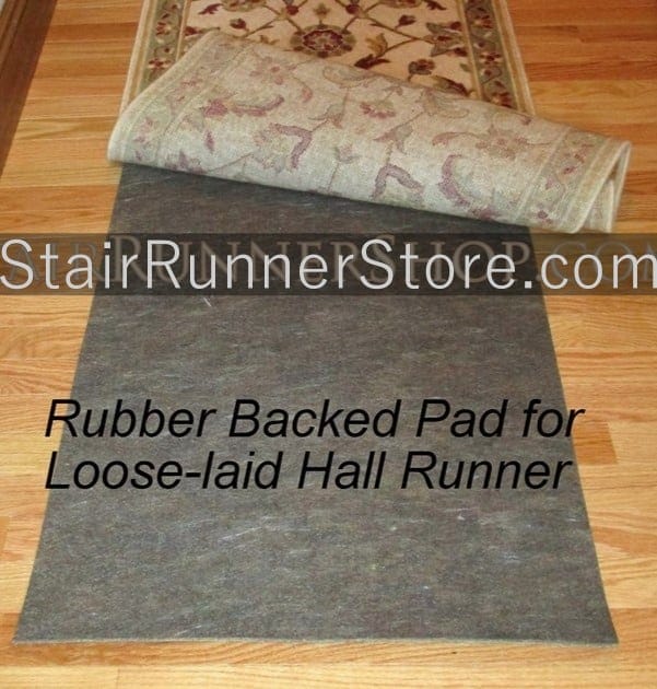 Rubber backed pad for a loose-laid hall runner